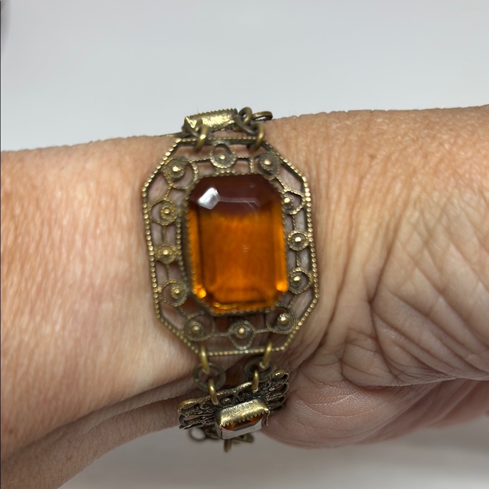Intricate and beautiful brass and topaz glass bracelet